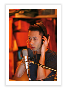 Photo of Cris Law in the studio recording his debut TwinkleU album